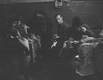 Jan 24 - Serov. Slobodin (at the table), Dyatlov, Thibeaux-Brignolle, and Dubinina. Visible mandolin (Krivonischenko's) and a knife. 