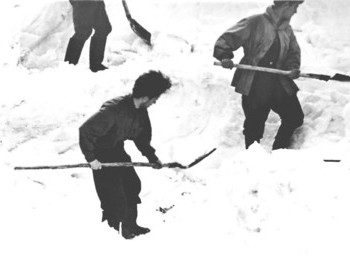 Suvorov and other rescuers digging up the den